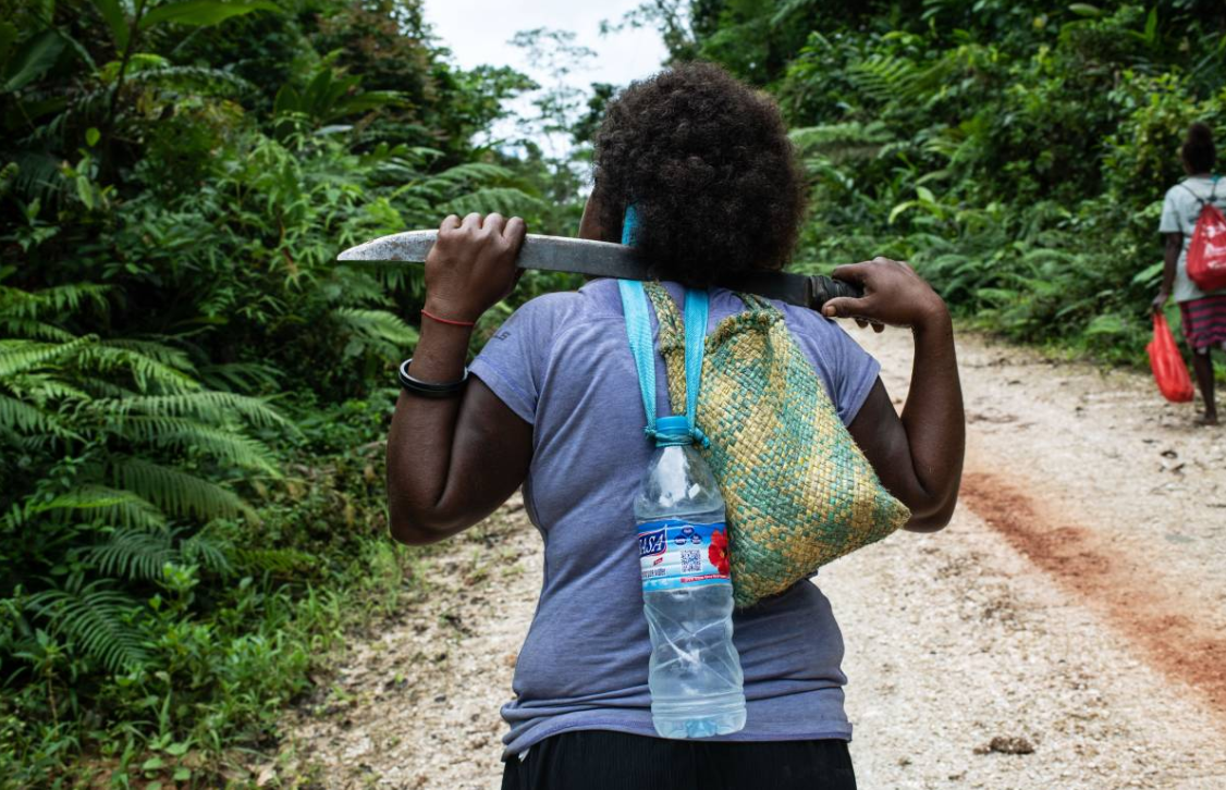 Judy Boifuana hikes in the jungle near Igwa village on the island of Malaita, Solomon Islands, September 18, 2019. Image by Thomson Reuters Foundation/Monique James. Solomon Islands, 2019. Judy Boifuana hikes in the jungle near Igwa village on the island of Malaita, Solomon Islands, September 18, 2019. Image by Thomson Reuters Foundation/Monique James. Solomon Islands, 2019.