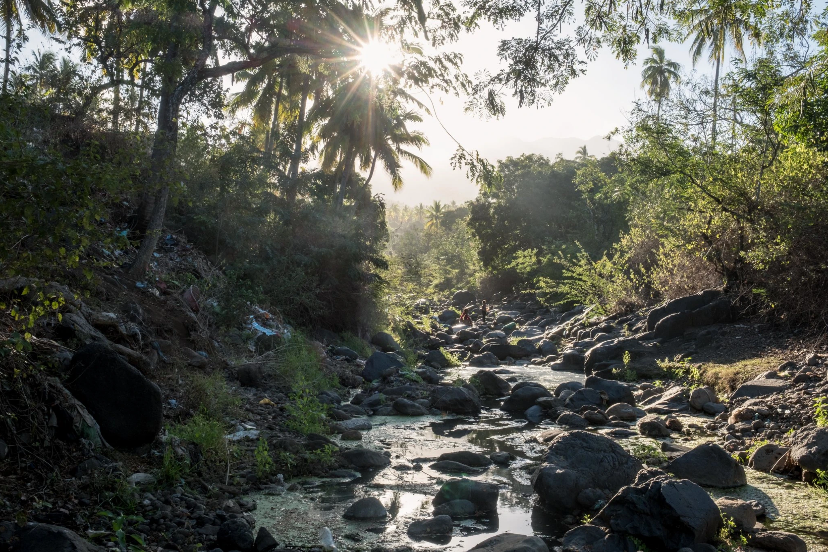 The trickle of a once-potent river on the island of Anjouan, in the Comoros. Image by Tommy Trenchard for The New York Times. Comoros, 2019. The trickle of a once-potent river on the island of Anjouan, in the Comoros. Image by Tommy Trenchard for The New York Times. Comoros, 2019.