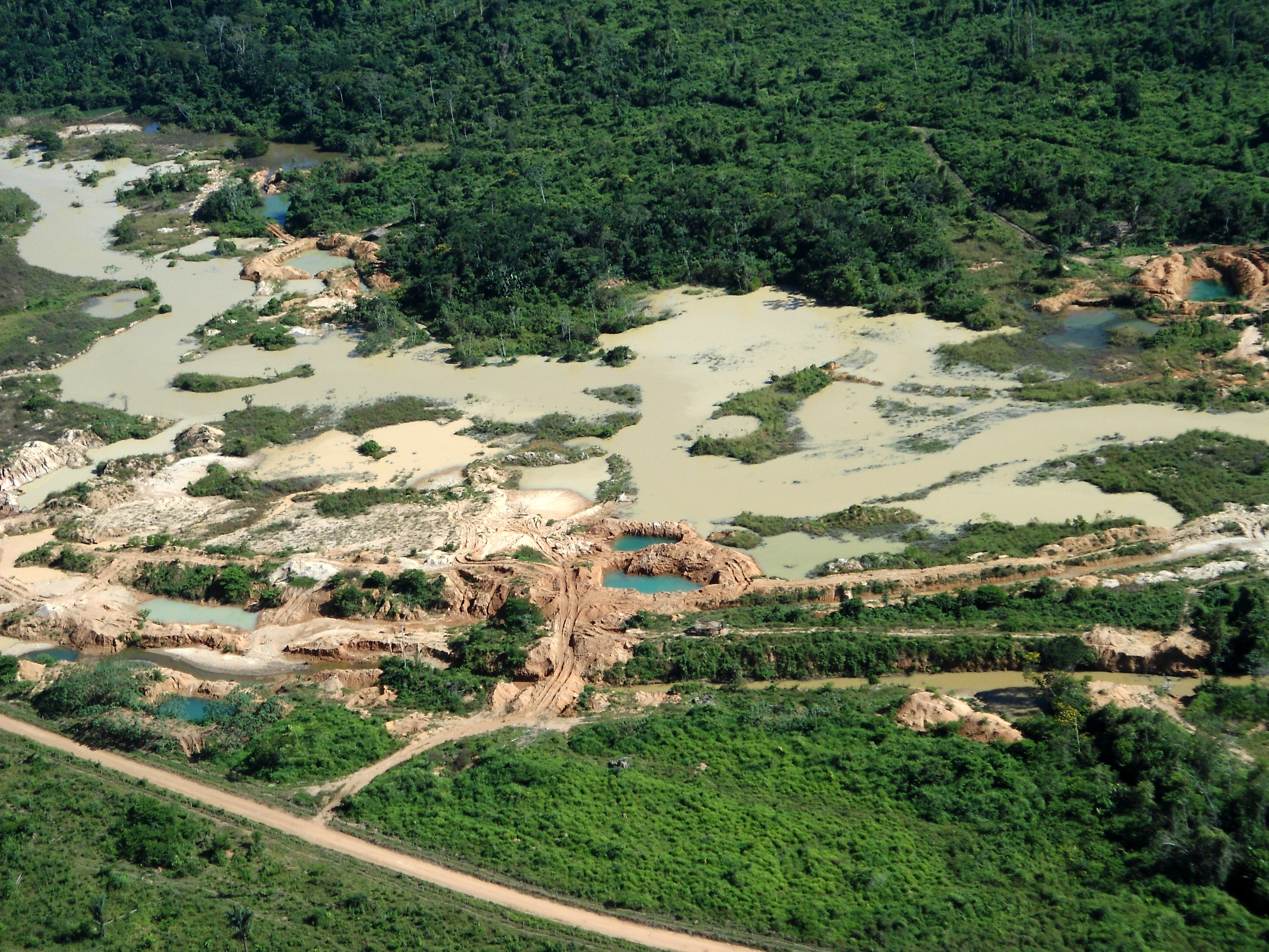 shutterstock_1162062136.jpg Aerial view of gold mining area in Amazon forest region in Pará. Image by Tarcisio Schnaider/Shutterstock. Brazil, date unknown.