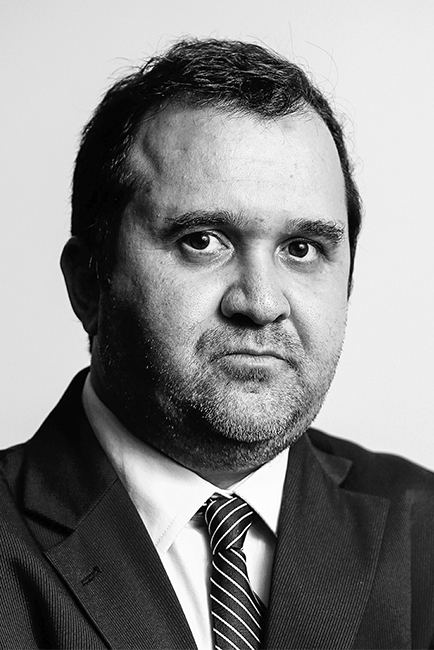 A man looks into the camera
