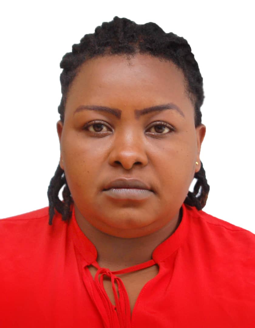 A person with braided hair and a red shirt.