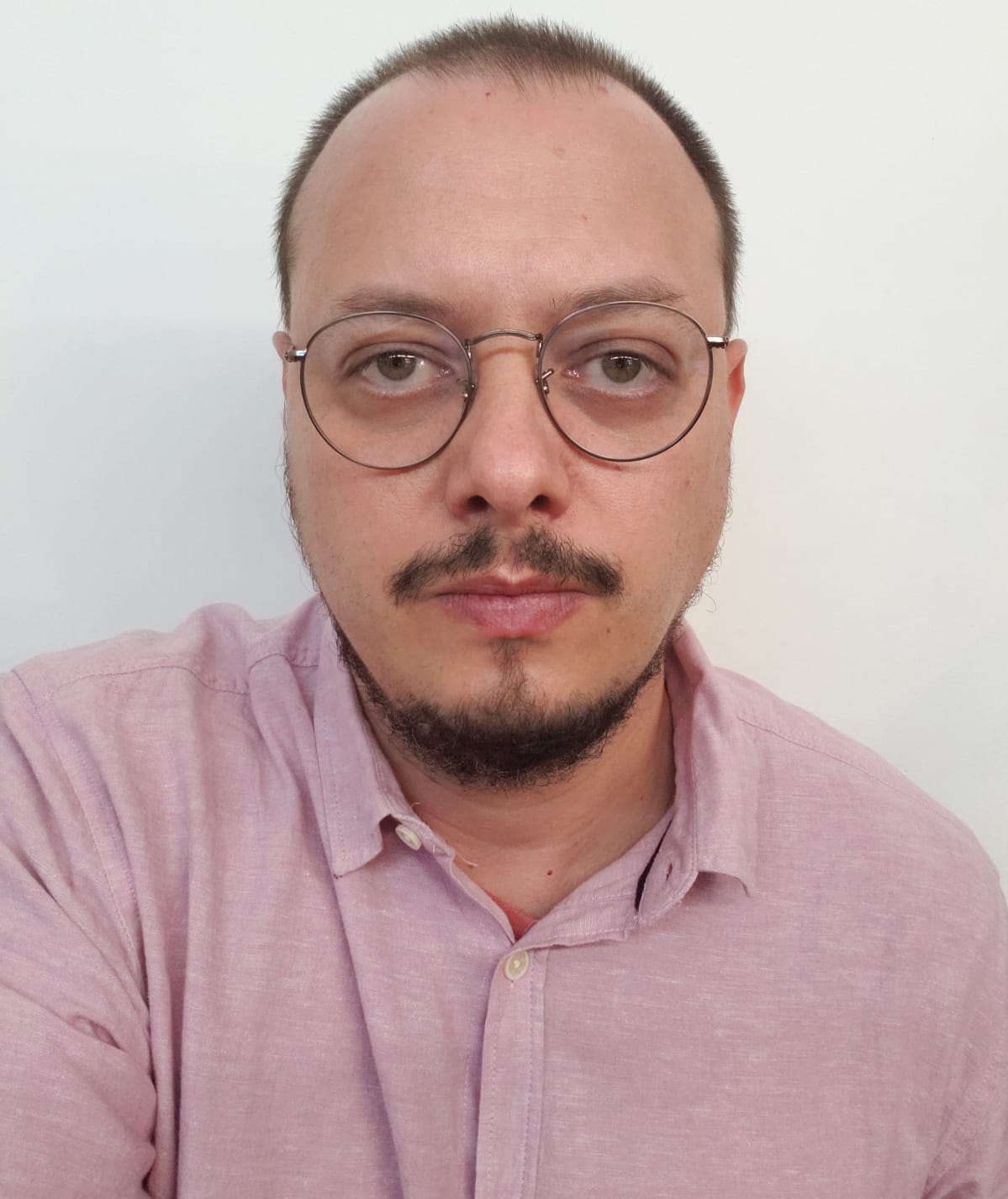 man stares at camera