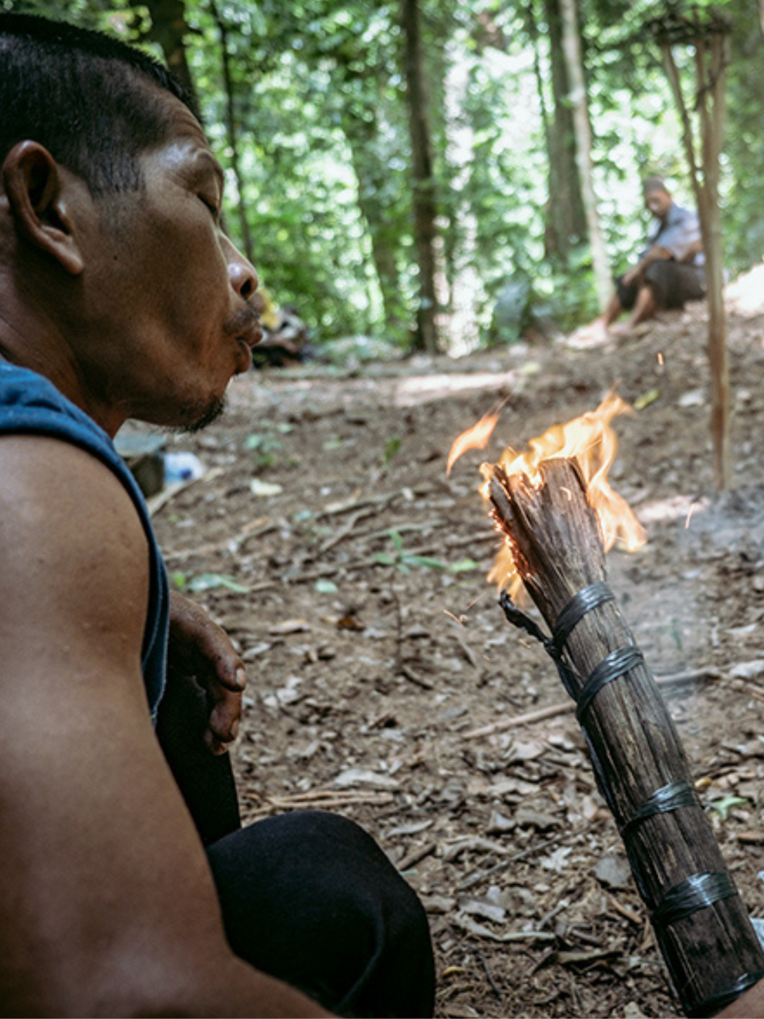 NEW S. Copy of Vertical thumbnail template 34 (1536 × 2048px) template-31.png a man blow a torch in a forest