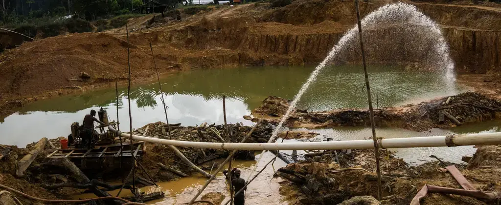 A mining operation in the goldfields that surround Mahdia, Region Eight. Image by Bram Ebus. Guyana, undated.
