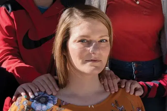 Brittany Smith, seen here with her children, faces life in prison for killing the man who raped her. Photograph by Nydia Blas for The New Yorker. United States, 2020.