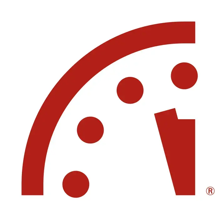 The Doomsday clock, the logo of The Bulletin of the Atomic Scientists, showing two and a half minutes to midnight.