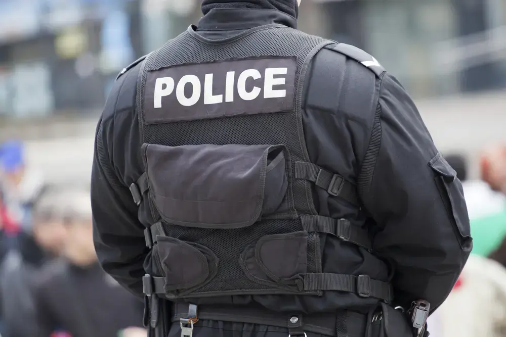 Detail of a police officer. Image by Shutterstock. United States, undated.