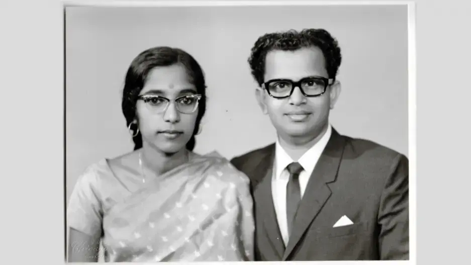 Studio photo of Indira and Bala Pillay. The Pillays lived in Singapore for a year before deciding to immigrate to the U.S. Image courtesy of Kavita Pillay/WGBH News.