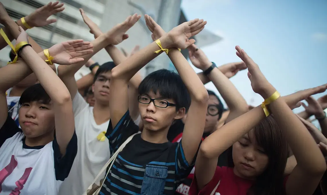 Joshua Wong (center) leading pro-democracy protests in Hong Kong. Image by Anthony Kwan/Getty Images. China, 2014.