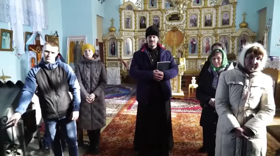 This local Ukrainian parish is deciding whether or not to continue recognizing the authority of the Russian Orthodox Church. Image by Simon Ostrovsky. Ukraine, 2019.