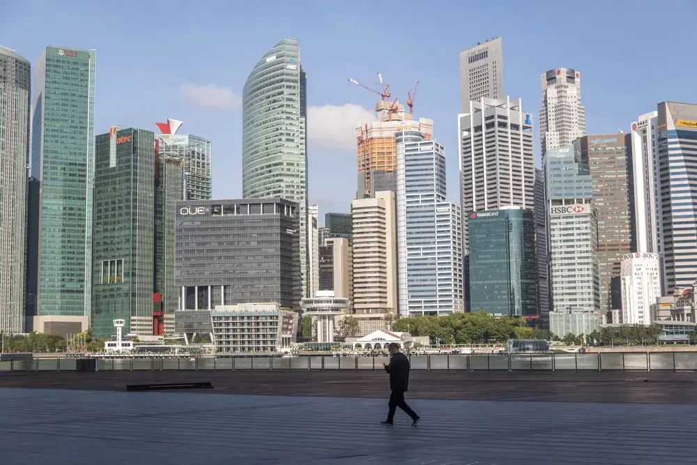 Marina Bay, Singapore - Singapore Business District goes empty and quiet during partial lockdown due to coronavirus. Image by Wisnu Haryo Yudhanto / Shutterstock. Singapore, 2020.