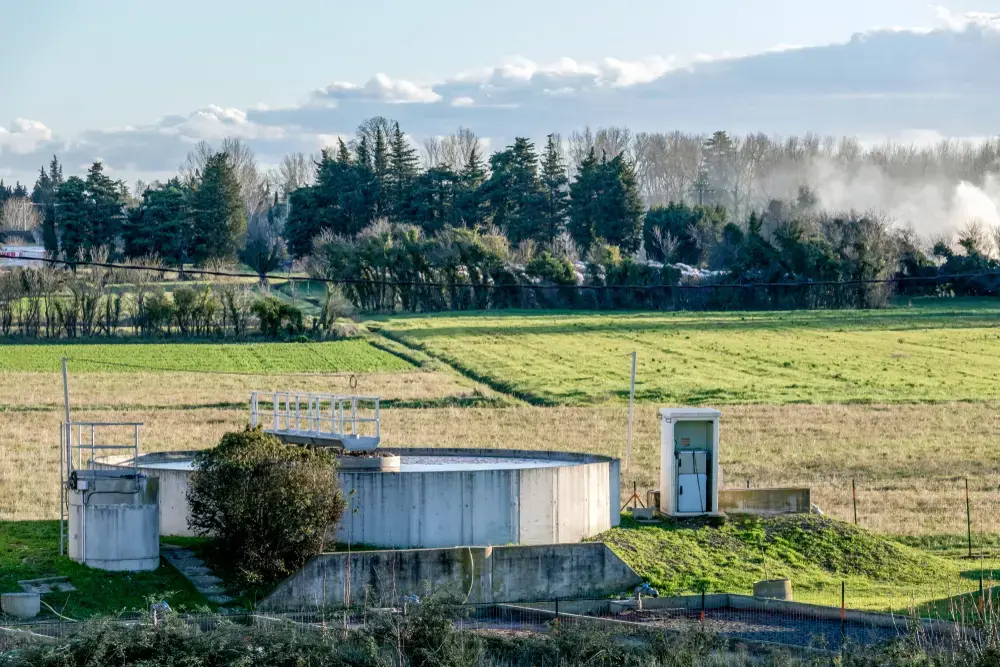Small circular sedimentation tank for waste water settling, purification, and sewage treatment for municipal waste water, containing mainly household sewage in rural countryside of France, Europe. Image by Shutterstock. France, undated.