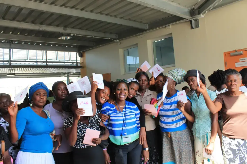 At the end of the education session, the group gathers for a picture. Most of these women will stay to get cervical cancer screenings and, if needed, cryotherapy. The other women will come back the next day to get screened. An individual screening takes about five minutes and women are moved through quickly. Both the nurses and Holdie perform the screenings on the women. Women who test positive line up against one wall and wait for the cryotherapy treatment. Cryotherapy is a painful, 11-minute long…
