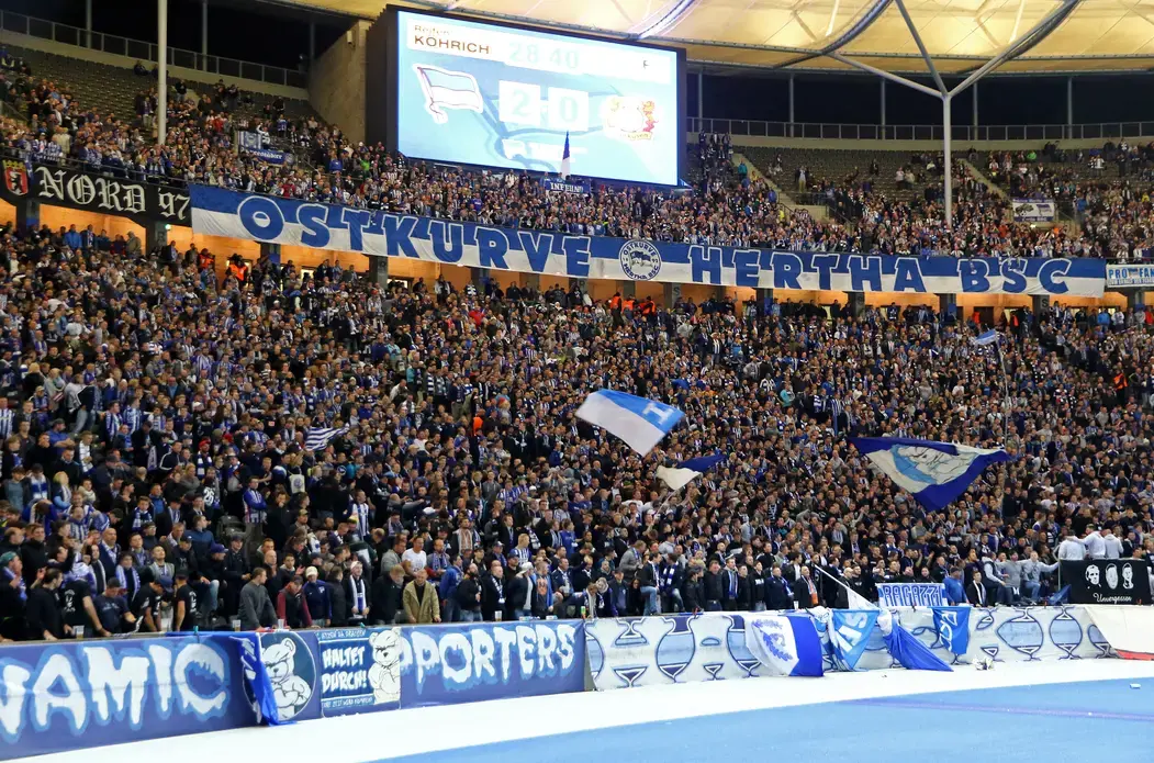 A scene from the past? Hertha BSC Berlin ultras seen during German Bundesliga game against Bayer 04 Leverkusen. Image by Oleksandr Prykhodko / Shutterstock. Germany, 2017.