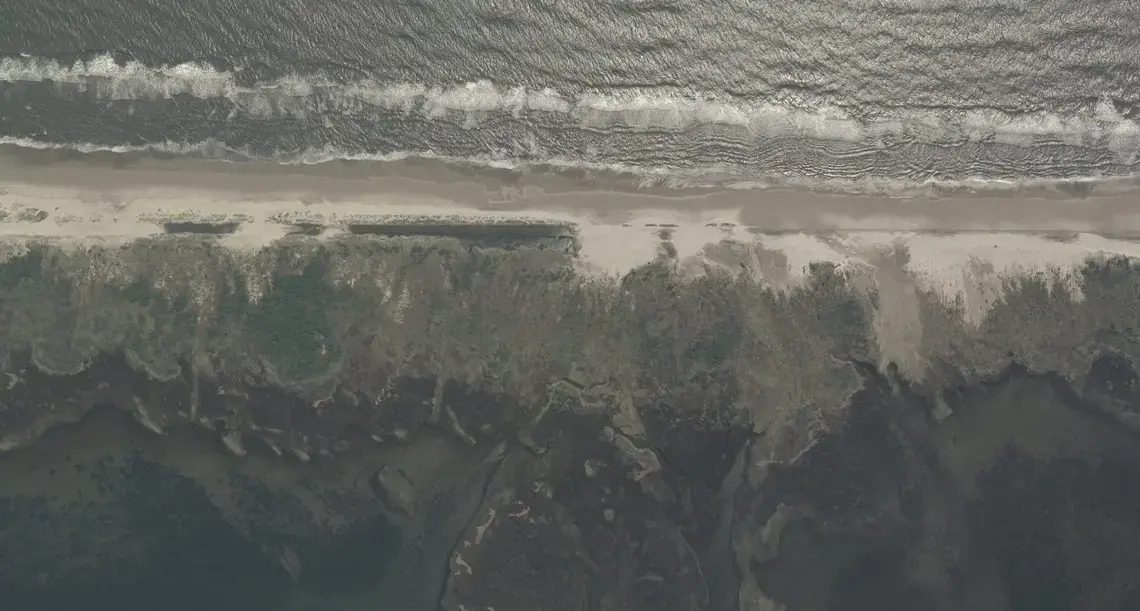 Ocracoke trouble spot along N.C. 12 shown August 29, 2011. Image by NCDOT Communications. United States, 2011.