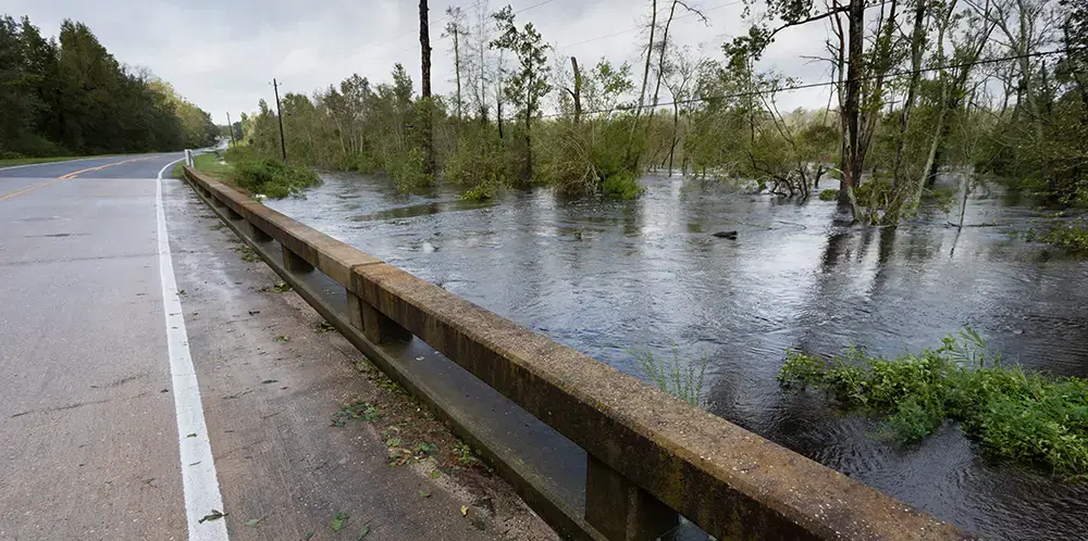 Water from Hurricane Florence rising under a bridge near Fayetteville, North Carolina. Image by Guy J. Sagi / Shutterstock.com. United States, 2018.