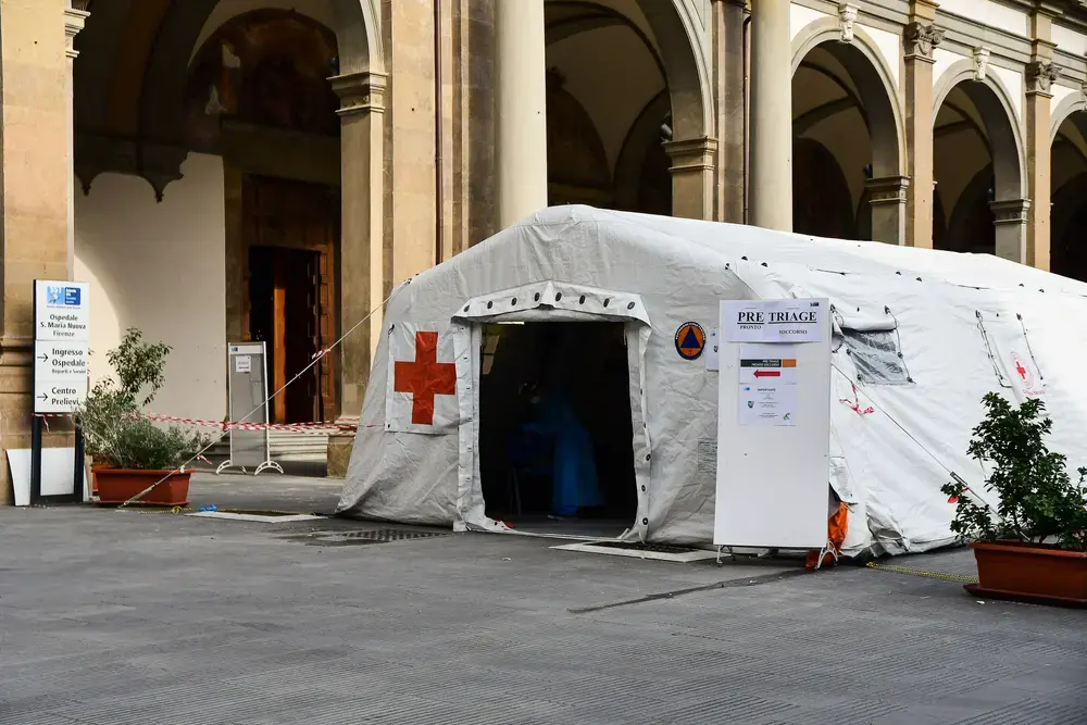 Specially equipped coronavirus station near the hospital in central Florence. Image by Elena.Katkova/Shutterstock. Italy, 2020.