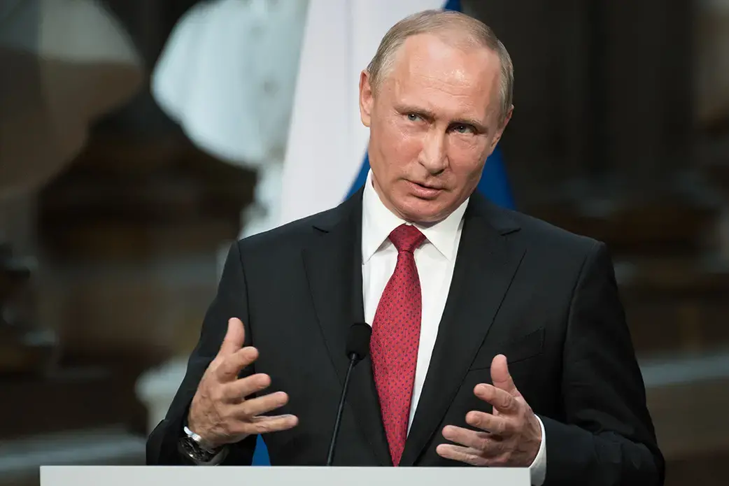 Russian President Vladimir Putin speaking at a press conference at the Palace of Versailles. Image by Frederic Legrand - COMEO / Shutterstock.com. France, 2017.
