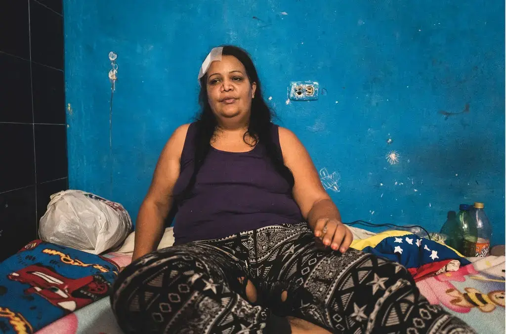 Erika, 42, being held at Poli-Naguanagua, Carabobo, for 73 days for disrupting public safety, is the first woman detained under the new “Abetting of Hate” law. She was protesting against the country's severe food shortages. Image by Ana María Arévalo. Venezuela, 2018. 