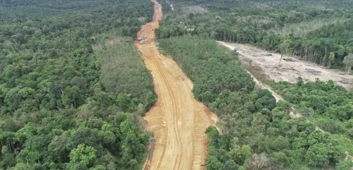 The company's new road will help make transporting coal easier. Image by Erwan Hermawan. Indonesia, 2020. The company's new road will help make transporting coal easier. Image by Erwan Hermawan. Indonesia, 2020.