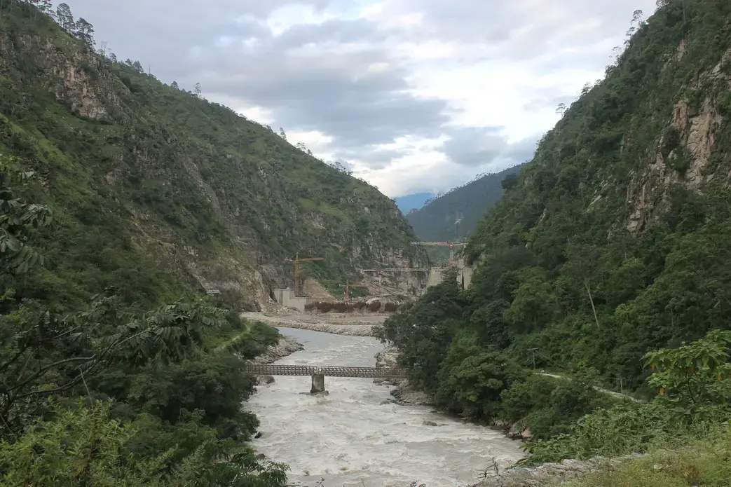 The Punatsangchhu River is the hotspot for hydropower construction in Bhutan: Pictured is the new mega Punatsangchhu-II hydroelectric project, delayed extensively by geologic challenges. Image by Emma Johnson. Bhutan, 2019.
