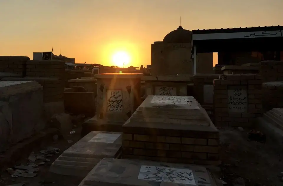 Graves sitting in Wadi-us-Salaam, the world's largest cemetery. Image by Zahra Ahmad. Iraq, 2019.