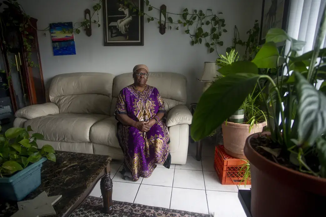 Yochebed Israel, 59, poses for a portrait inside her Tampa, Florida, apartment on Monday, Aug. 17, 2020. Israel, a nursing assistant, found an eviction notice on her door in May after being unable to pay rent since she contracted COVID-19 from her daughter in April, and could not return to work. “There’s a lot of despair in this situation,” Israel said. “Not only are you sick from COVID-19, you miss work, you miss your job, you miss getting paid, you miss a lot of things that dominoes into this situation.”…