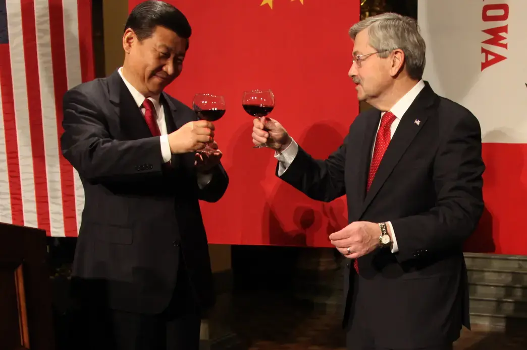 Chinese President Xi Jinping, left, shares a toast with U.S. Amb. Terry Branstad in February 2012 at the Iowa State Capitol in Des Moines. Xi, then vice president, and Branstad, then Iowa’s governor, first met in 1985 in Iowa. Image by Kelsey Kremer. United States, 2012.
