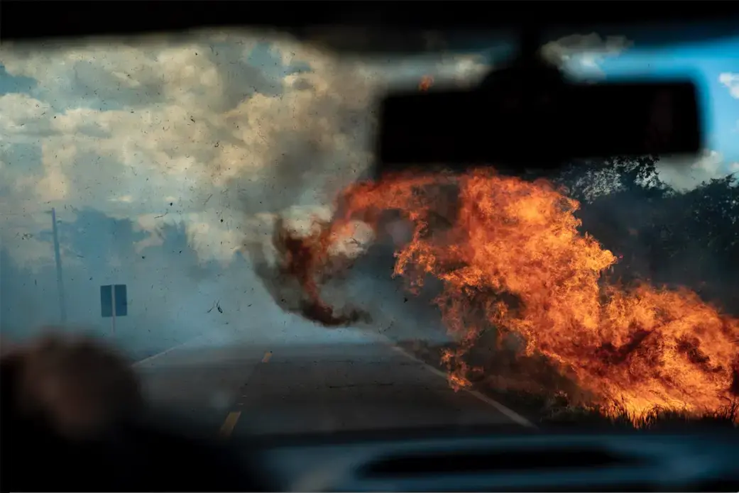 Fire raging along the Trans-Amazonian Highway. Image by Spenser Heaps. Brazil, 2019.