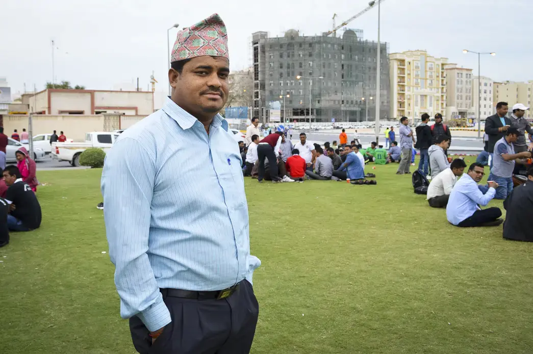 Dhurba B.K. attends a gathering of Nepalese migrant workers in Doha, Qatar. B.K. is one of about 400,000 Nepalese workers there, many of whom struggled with whether to stay after an April 2015 earthquake damaged huge portions of Nepal. Image by Shilu Manandar. Qatar, 2016.