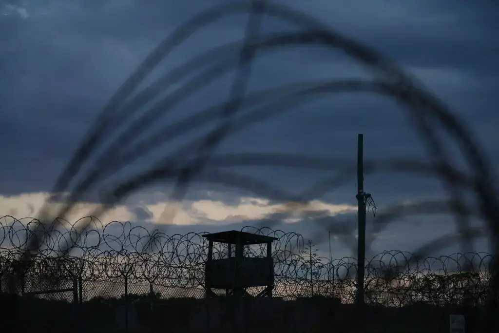 Mohammed al-Qahtani was brutally interrogated at Camp X-Ray, above, a detention facility at Guantánamo Bay. Image by Doug Mills/The New York Times. United States, undated.