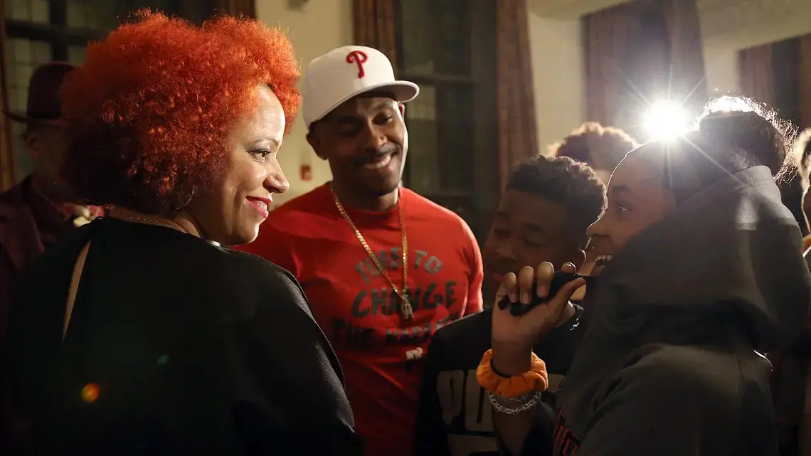 Nikole Hannah-Jones talks with a student at the University of Chicago's Institute of Politics 1619 event. Image by Dylan Burrus, Courtesy of the University of Chicago's Institute of Politics. United States, 2019.