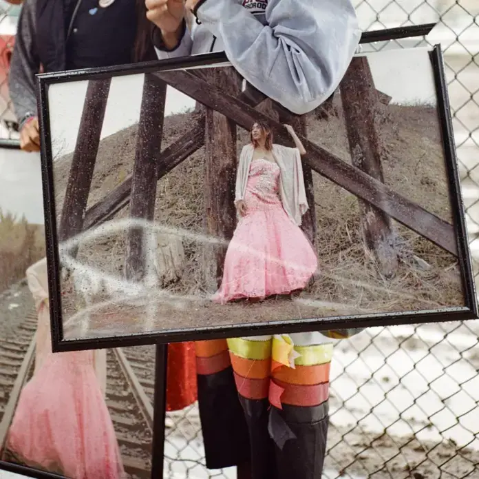 Valenda Morigeau, Jermain Charlo’s aunt, holds a photograph of her niece at an event for missing and murdered Indigenous women and girls at Missoula fair in Montana. Jermain Charlo went missing on 15 June 2018 in Missoula at age 23. Image by Sara Hylton. United States, 2019.