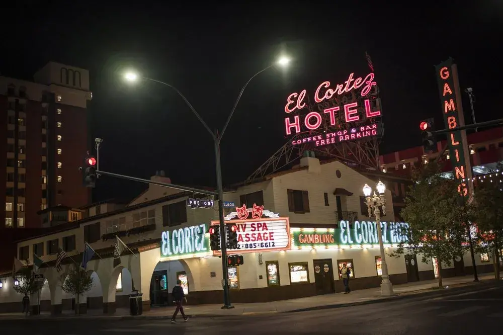 Two men walk past the El Cortez hotel-casino in downtown Las Vegas, Wednesday, Nov. 11, 2020.&nbsp;Image by Wong Maye-E / AP Photo. United States, 2020.