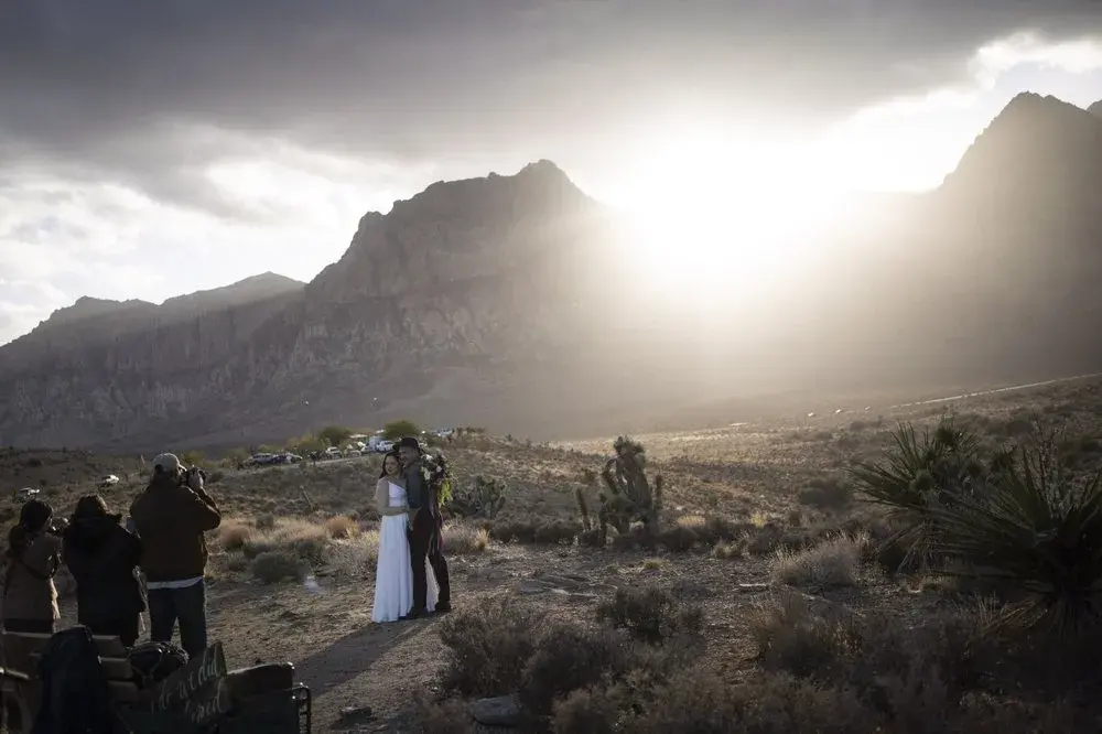 A couple poses for wedding photographs in the Red Rock National Conservation Area near Las Vegas, Sunday, Nov. 8, 2020.&nbsp;Image by Wong Maye-E / AP Photo. United States, 2020.