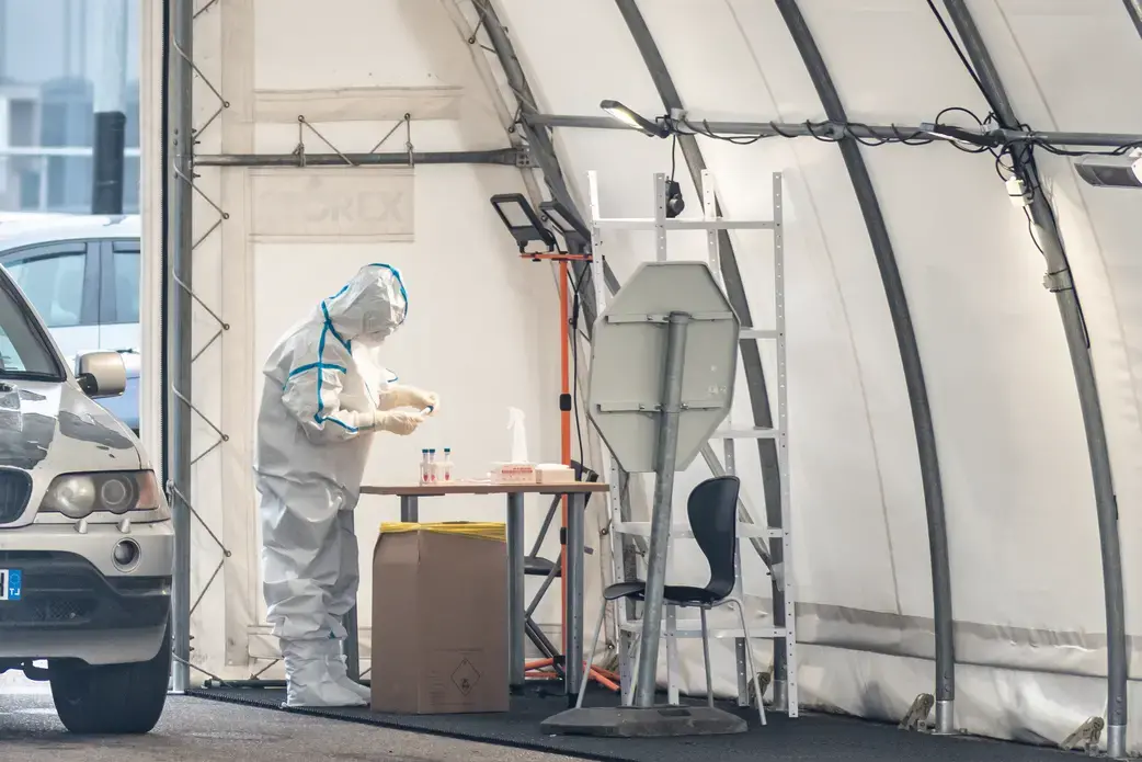 A mobile COVID-19 testing station in Vilnius. Image by Michele Ursi / Shutterstock. Lithuania, 2020.