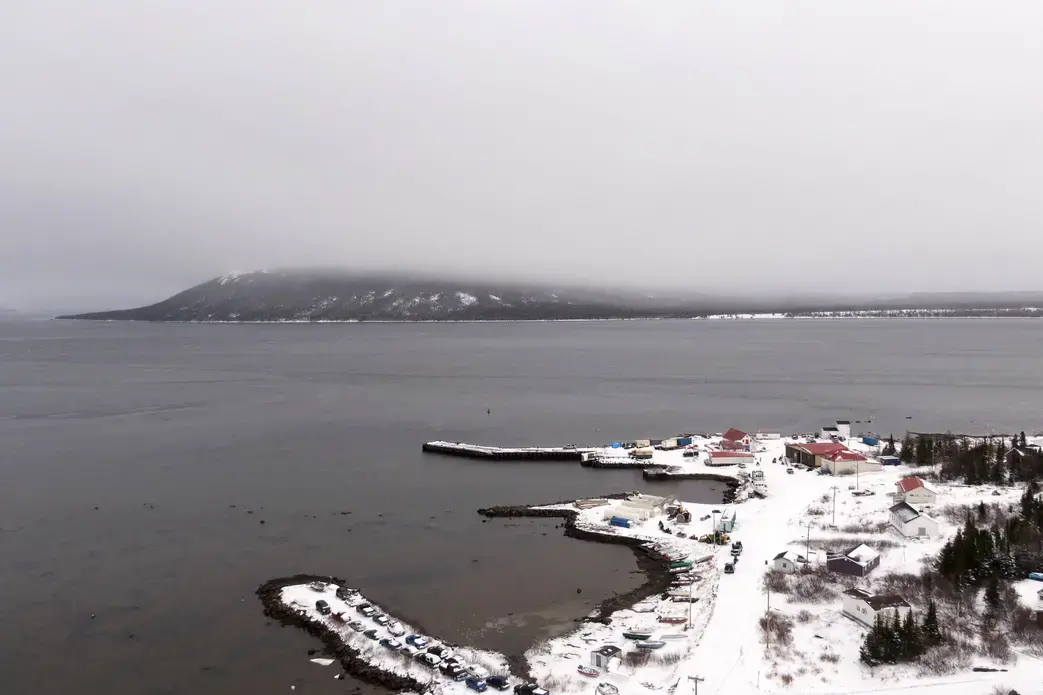 The town of Rigolet reaches out into the waters of Lake Melville on the coast of Labrador on November 14, 2019. Image by Michael G. Seamans. Canada, 2019.