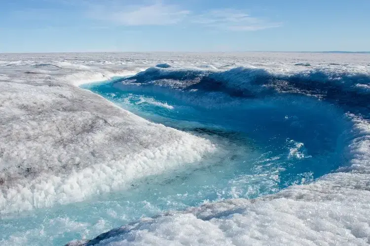 As humans warm the planet, surface melt is increasing. If the entire ice sheet melted, it would cause sea level to rise roughly 23 feet, inundating coastal areas around the world. Image by Amy Martin. Greenland, 2018. 