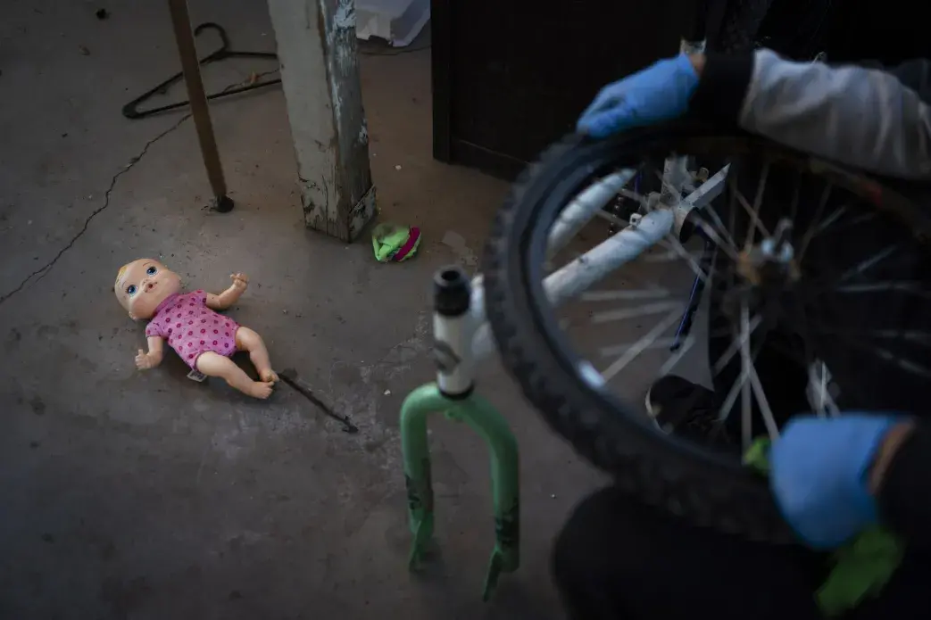 A doll belonging to a grandchild of Norma Flores lies on the ground in the backyard of her home in Henderson, Nev., Tuesday, Nov. 10, 2020.&nbsp;Image by Wong Maye-E / AP Photo. United States, 2020.