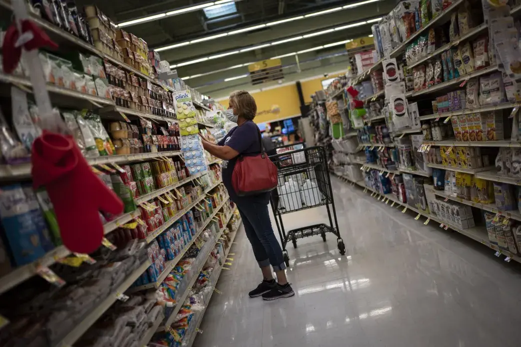 Norma Flores, 54, shops for snacks for her grandchildren at a store near her home in Henderson, Nevada, Tuesday, Nov. 10, 2020.&nbsp;Image by Wong Maye-E / AP Photo. United States, 2020.