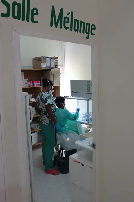 Nurses prepare chemotherapy for patients awaiting treatment. Image by Kate Corrigan. Haiti, 2017.&nbsp;<br />
