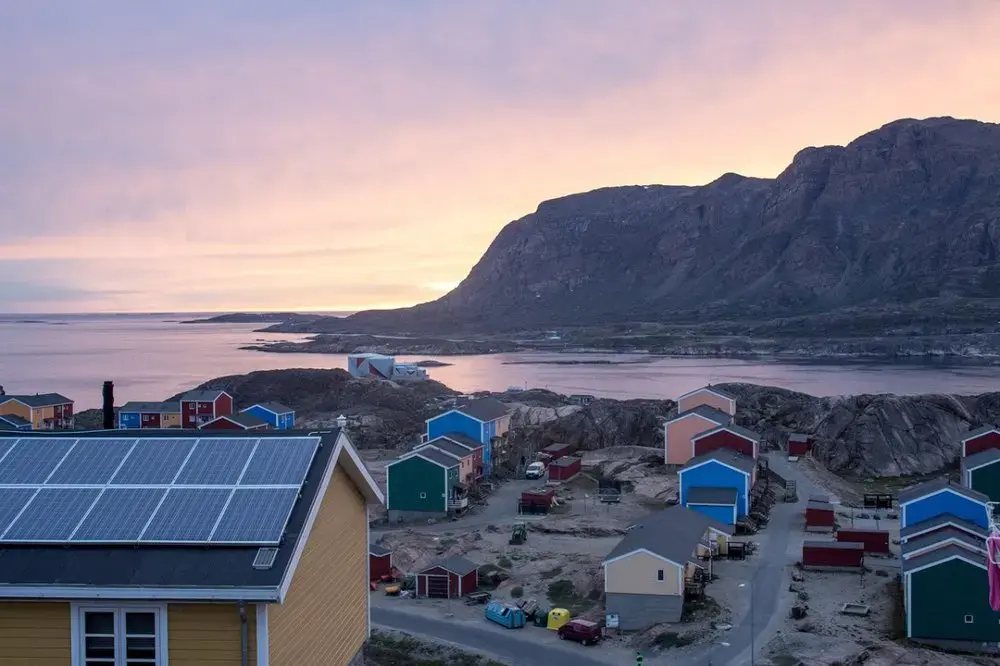 Since three-quarters of Greenland is covered by an ice sheet, people live in the thin strip of land between the ice and the ocean. Image by Amy Martin. Greenland, 2018.