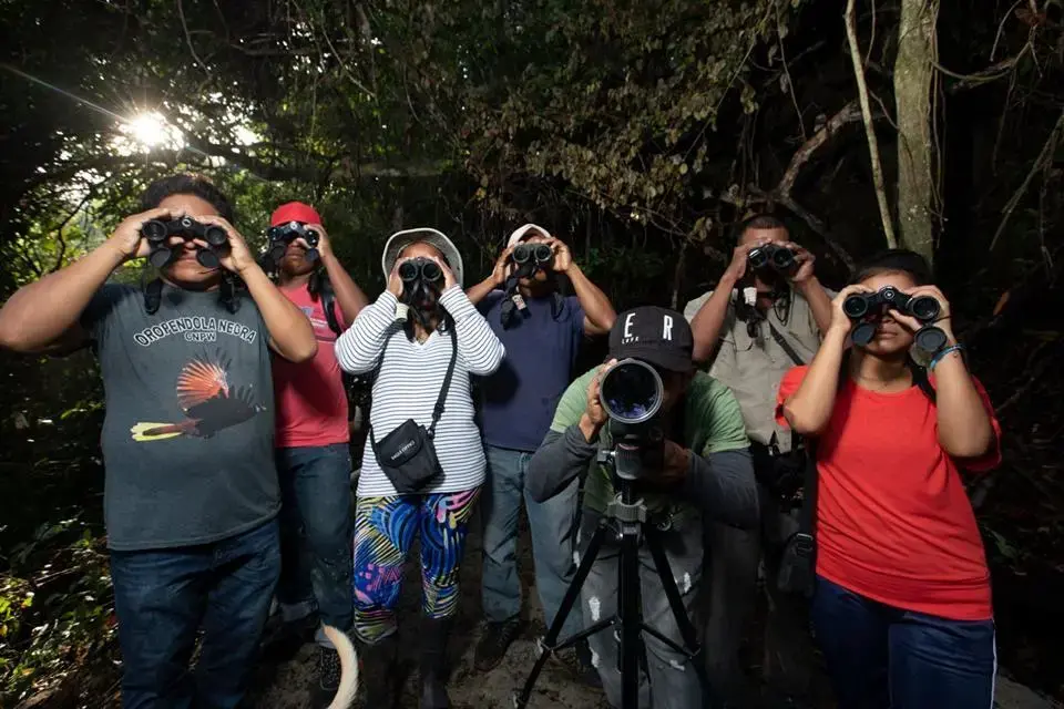 Wounnan bird watchers of Puerto Lara, Darien gap, Panama. Image courtesy of Guido Bilboa/La Prensa. 2019.