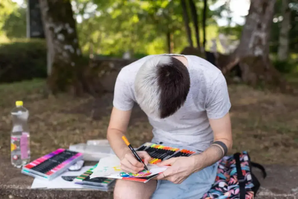 Faced with increasing levels of abuse in their hometown of Odessa, Ukraine, Sergi and his boyfriend Igor moved to Besançon, France. Igor had been attacked at a Pride march in Odessa, an incident that left him with head wounds and needing glasses. He and Sergi were chased in the streets in their home town by men shouting, ‘Death to faggots!’ and they began receiving death threats. Image by Bradley Secker. France, 2020.