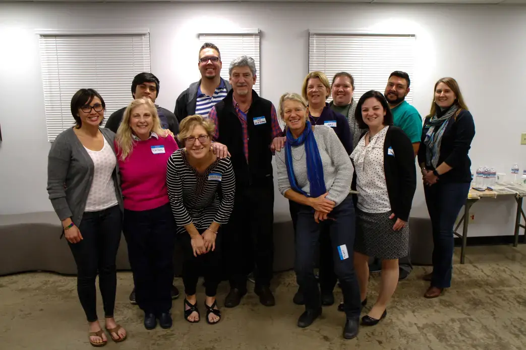 Don Belt poses with Amy Schmitz Weiss, associate professor of journalism and media studies at San Diego State University and the whole Out of Eden Walk on Campus Workshop crew. Image by Lauren Shepherd. United States, 2017.