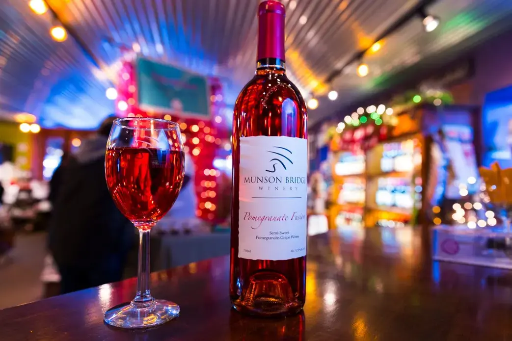 A bottle a wine is shown at the Munson Bridge Winery in Withee. Image by Mark Hoffman. United States, 2019.