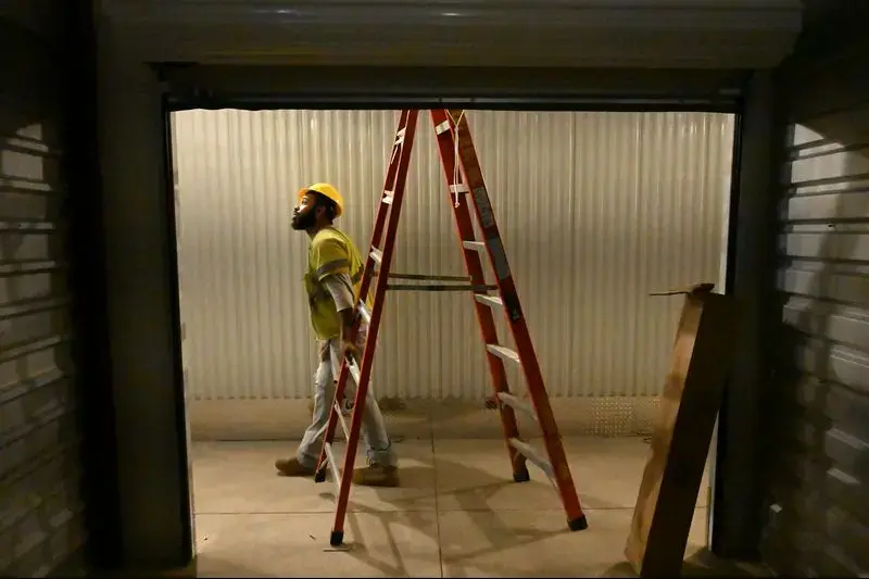 Working as an electrician’s helper, Arthur Gilliam earned $13 an hour. To pay his child support, the state garnished a third of that, leaving him a gross income of just $1,500 a month. “I am so hurt when I be seeing my check,” says Gilliam, who eventually quit the job. He would think, “Oh, child support got me, all right.” Image by Lloyd Fox / Baltimore Sun. United States, undated.