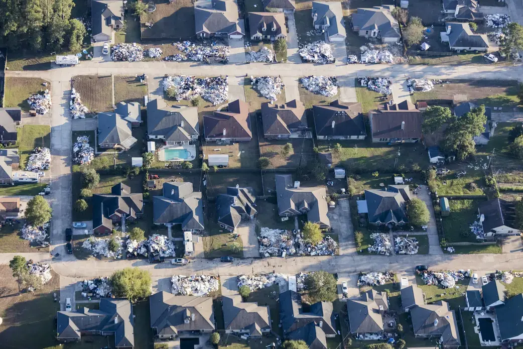 A real-estate agent from Vidor says that, in the wake of the hurricane, the neighborhood of the Wexford Park was 'a complete loss. Not one home came out of it.' Image by Alex MacLean. United States, 2017.
