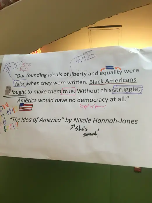 Image of 1619 student work. Students use markers to respond to quote from The 1619 Project.