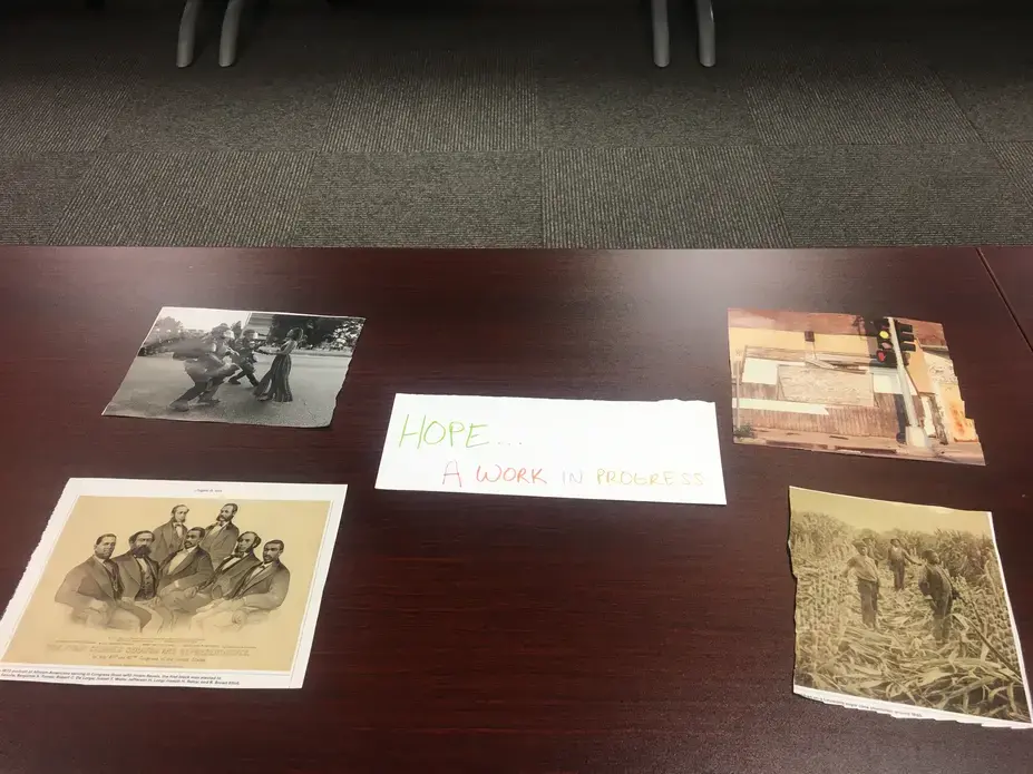 Participants in a professional development workshop in Houston, Texas,&nbsp;curate and title photography exhibitions using images from The 1619 Project.